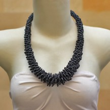 'Grey Beads Rolled