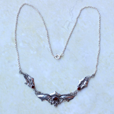Carved Silver with Ruby