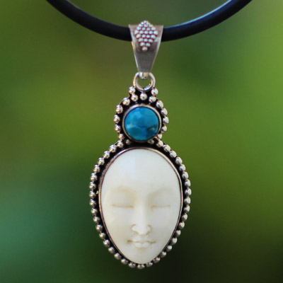 Oval face with stone